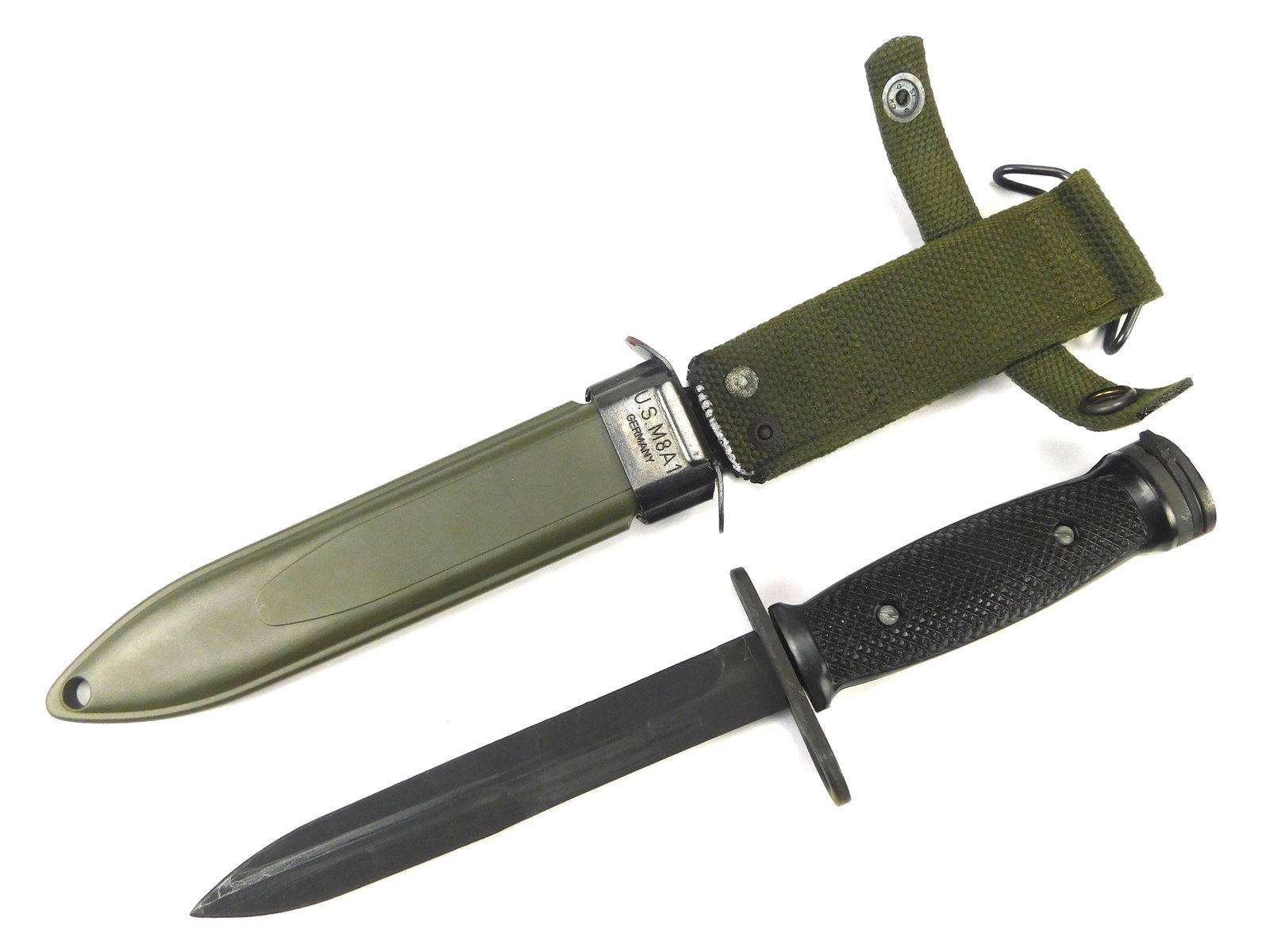 US M4 AKI Commercial Bayonet Knife for M1 Carbine: US M4 AKI Commercial Bayonet for M1 Carbine with Scabbard. Solid. 11 3/4" long with 6 7/8" blade.