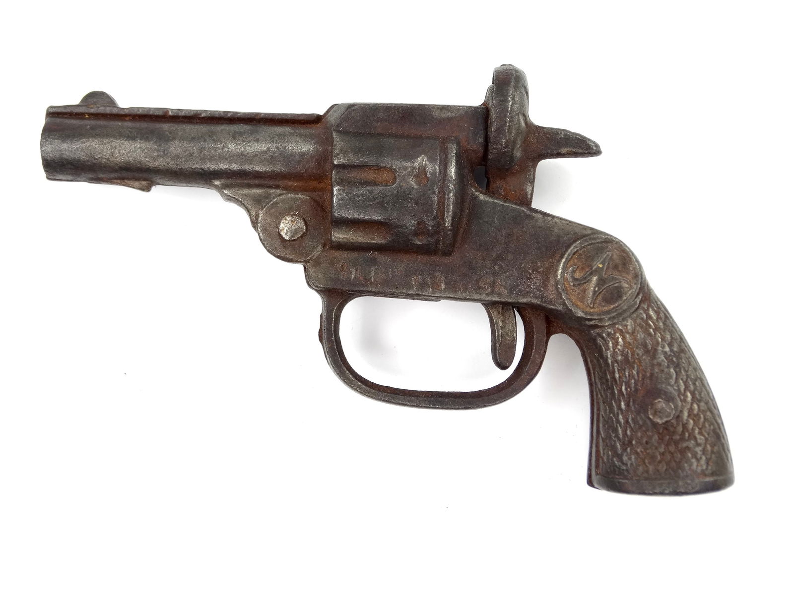 Vintage US Cast Iron " N " Toy Cowboy Cap Gun Single Action Revolver Pistol: Vintage US Cast Iron "N" Toy Cap GunIt's not my area of expertise but I think everything works correctly. No international shipping.