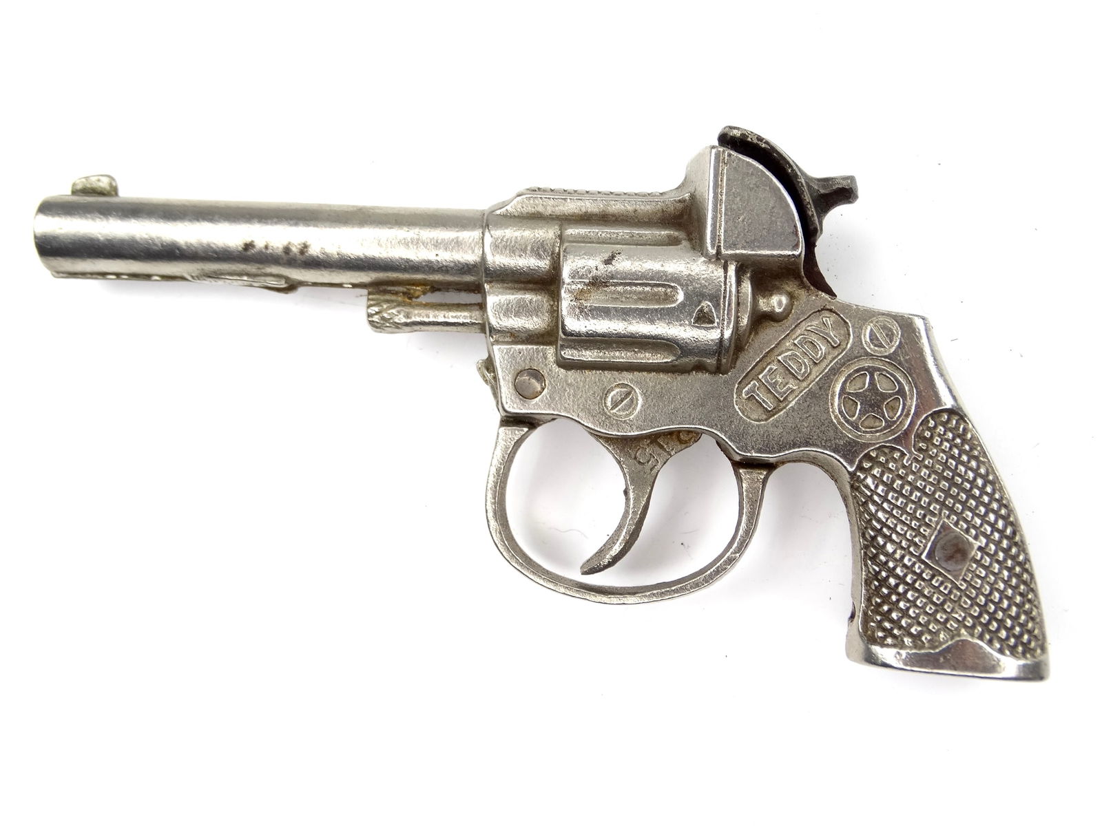 Vintage US Teddy Toy Cap Gun Pistol Single Action Revolver Western Cowboy: Vintage US Teddy Toy Cap GunIt's not my area of expertise but I think everything works correctly. No international shipping.