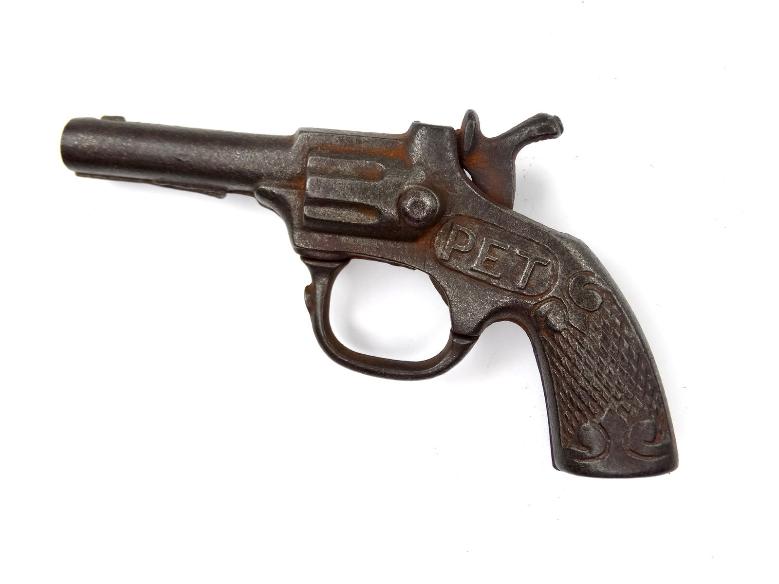 Vintage US Cast Iron Diecast Pet Toy Cap Gun Single Action Revolver Pistol: Vintage US Cast Iron Pet Toy Cap GunIt's not my area of expertise but I think everything works correctly. No international shipping.
