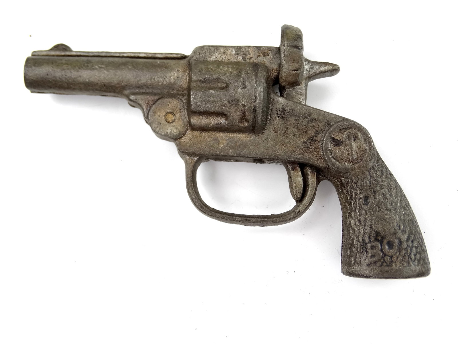 Vintage US Cast Iron " A " Toy Cowboy Cap Gun Single Action Revolver Pistol: Vintage US Cast Iron "A" Toy Cap GunIt's not my area of expertise but I think everything works correctly. No international shipping.
