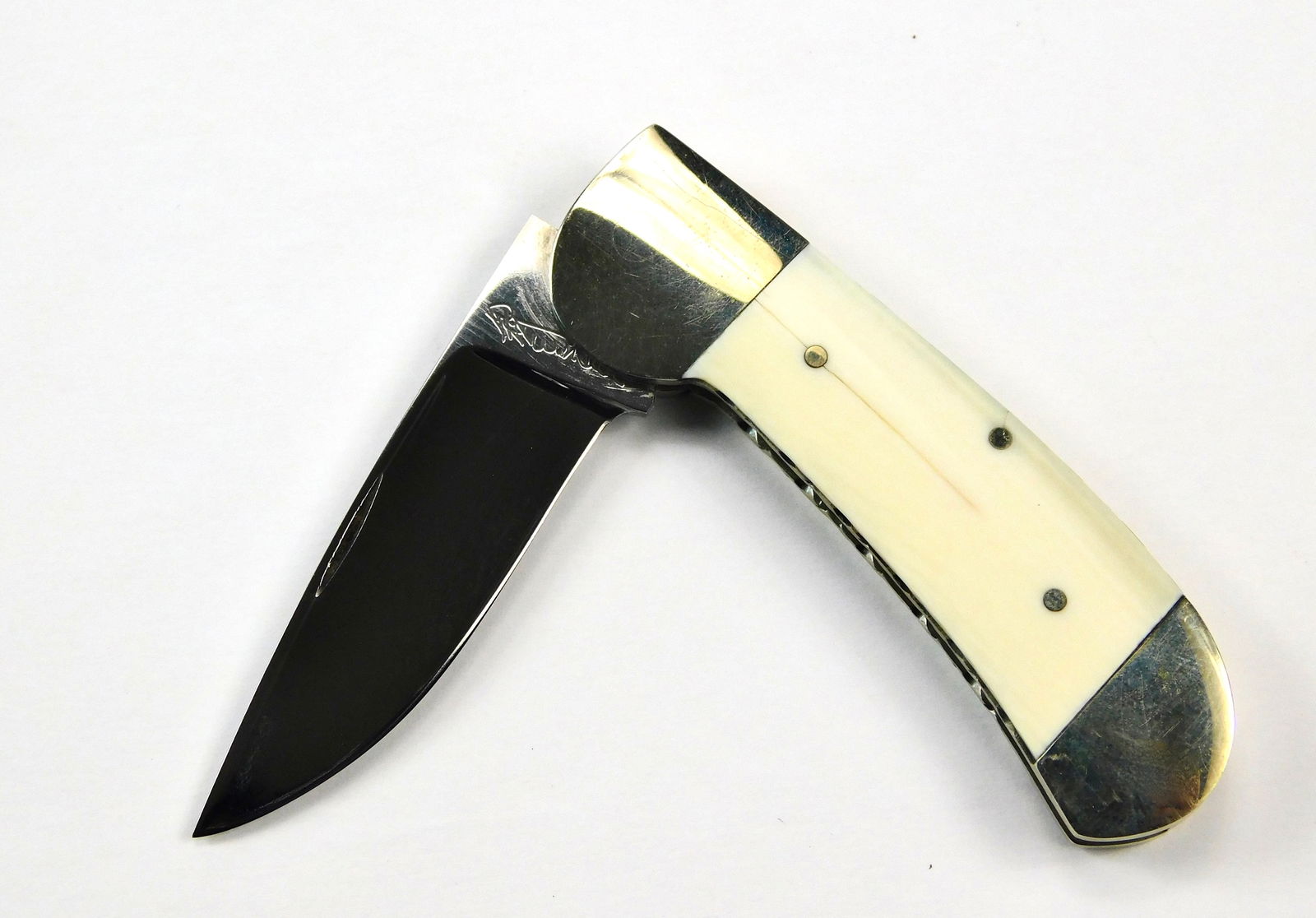 Vintage Custom Made by Ralph Turnbull Folding Pocket Knife: Custom Made by Ralph Turnbull Folding Pocket Knife. Blade snaps, no wobble. Polished ox bone handle plates. Measurements are pictured. No international shipping for this item.