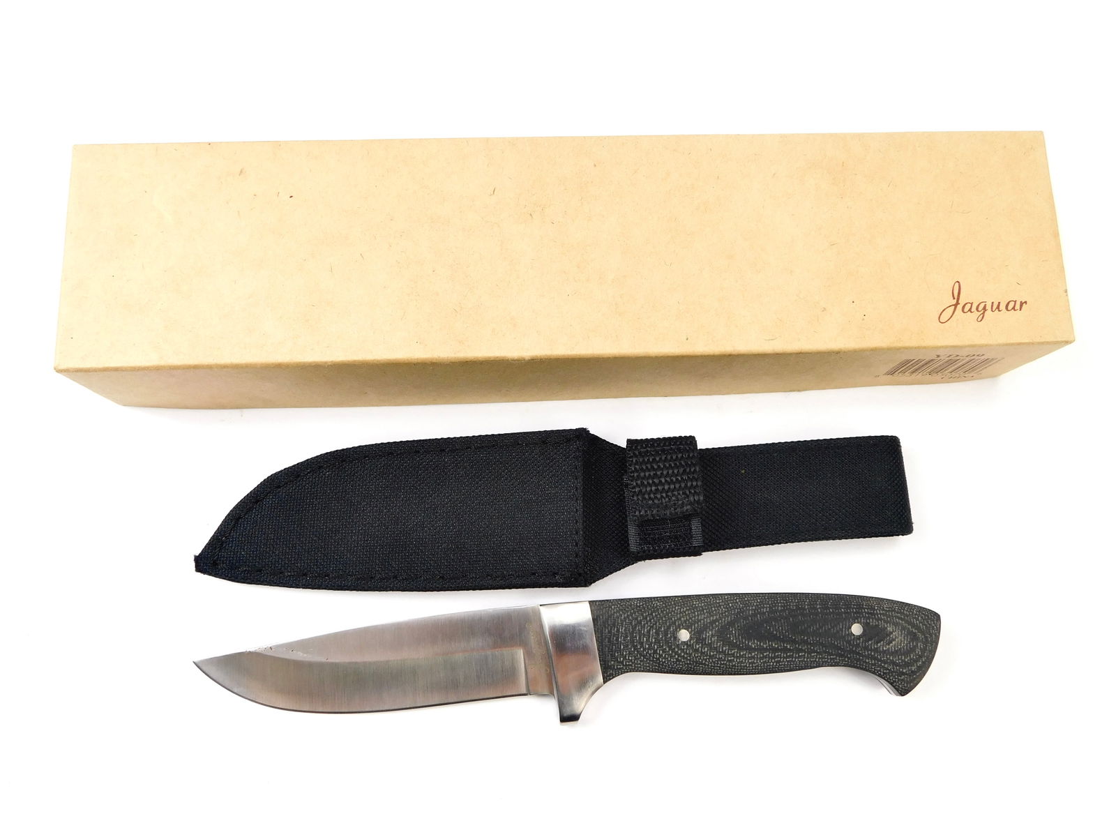 Jaguar Skinning Hunting Knife w/ Sheath Box: Jaguar Skinning Hunting Knife. With sheath and Box. New old stock. Tight, no loose parts. Made in China. The knife is 8 3/8" long with a 3 7/8" blade.