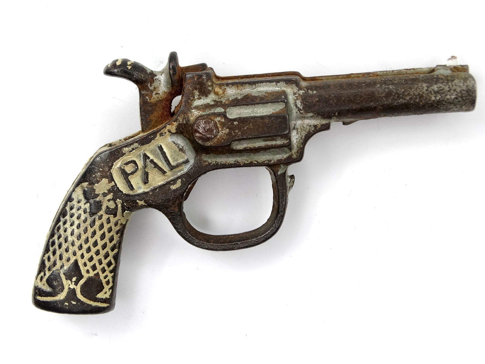 Vintage US Pal Mini Toy Cap Gun Pistol Single Action Revolver Cowboy Western 30: Vintage US Pal Mini Toy Cap Gun. It's not my area of expertise but I think everything works correctly.