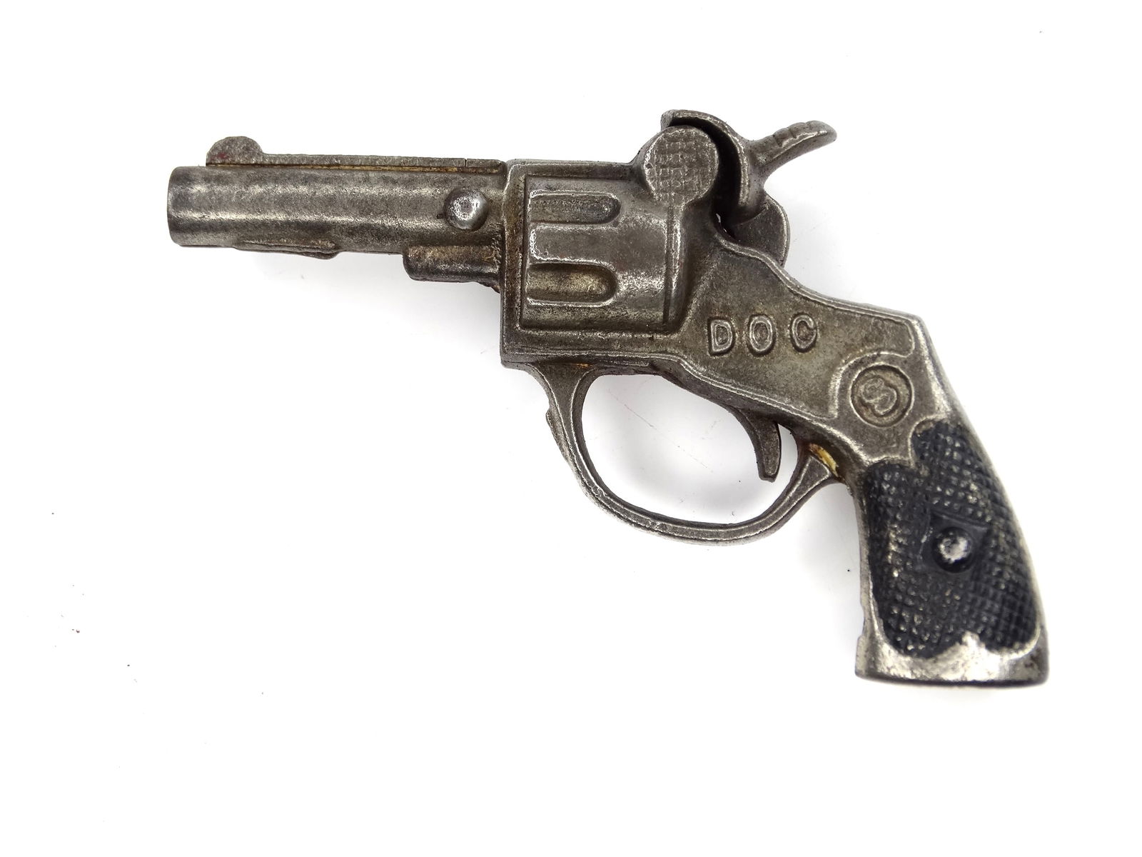 Vintage US Cast Iron Diecast Dog Toy Cap Gun Single Action Revolver Pistol: Vintage US Cast Iron Dog Toy Cap GunIt's not my area of expertise but I think everything works correctly. No international shipping.