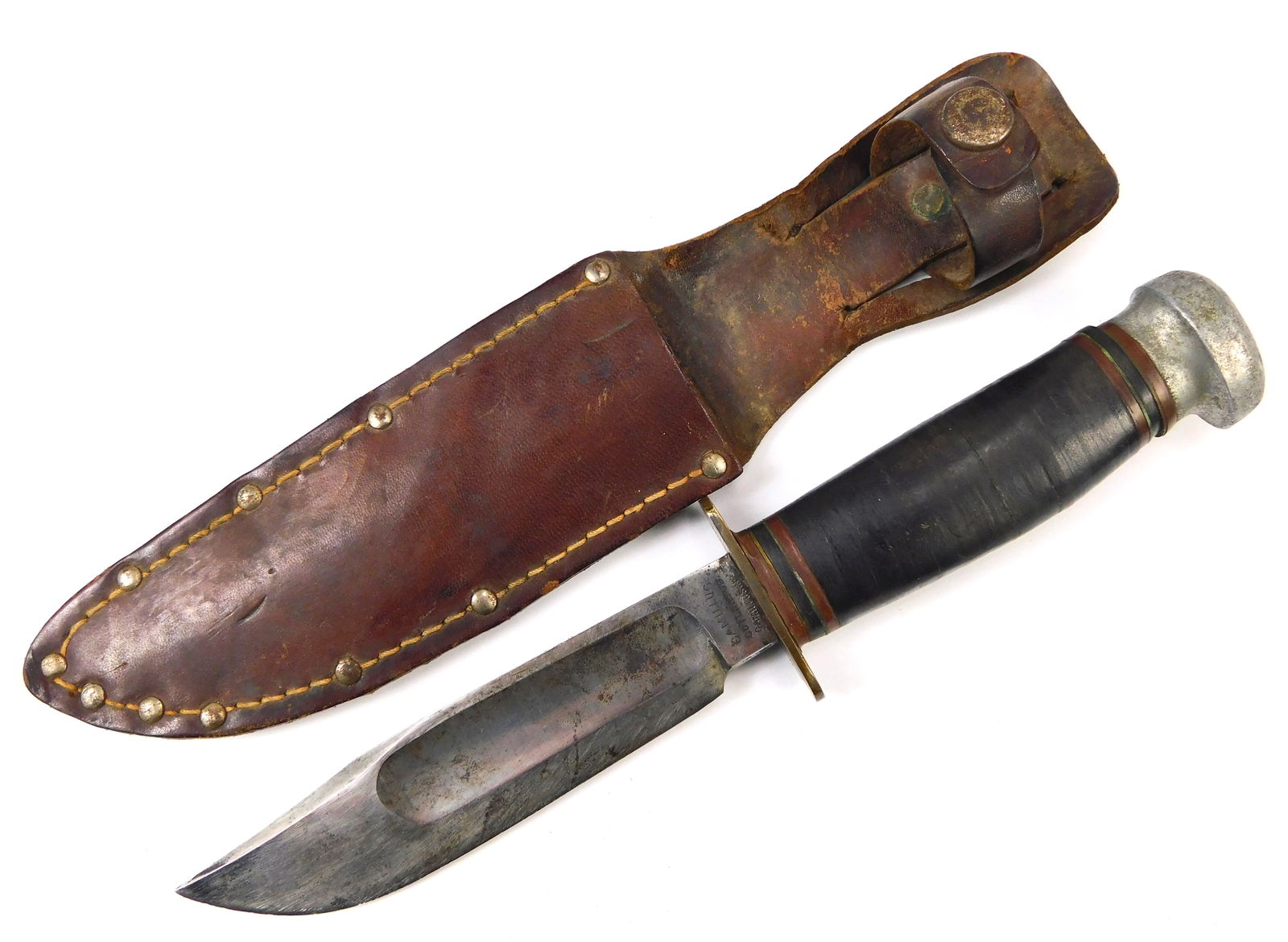 US WW2 Camillus MK1 Fighting Hunting Knife: US WW2 Camillus MK1 Fighting Hunting Knife with Leather Sheath. The guard is a bit loose. 9 1/8" long with a 5" blade. LiveAuctioneers is currently displaying only their own expensive shipping options