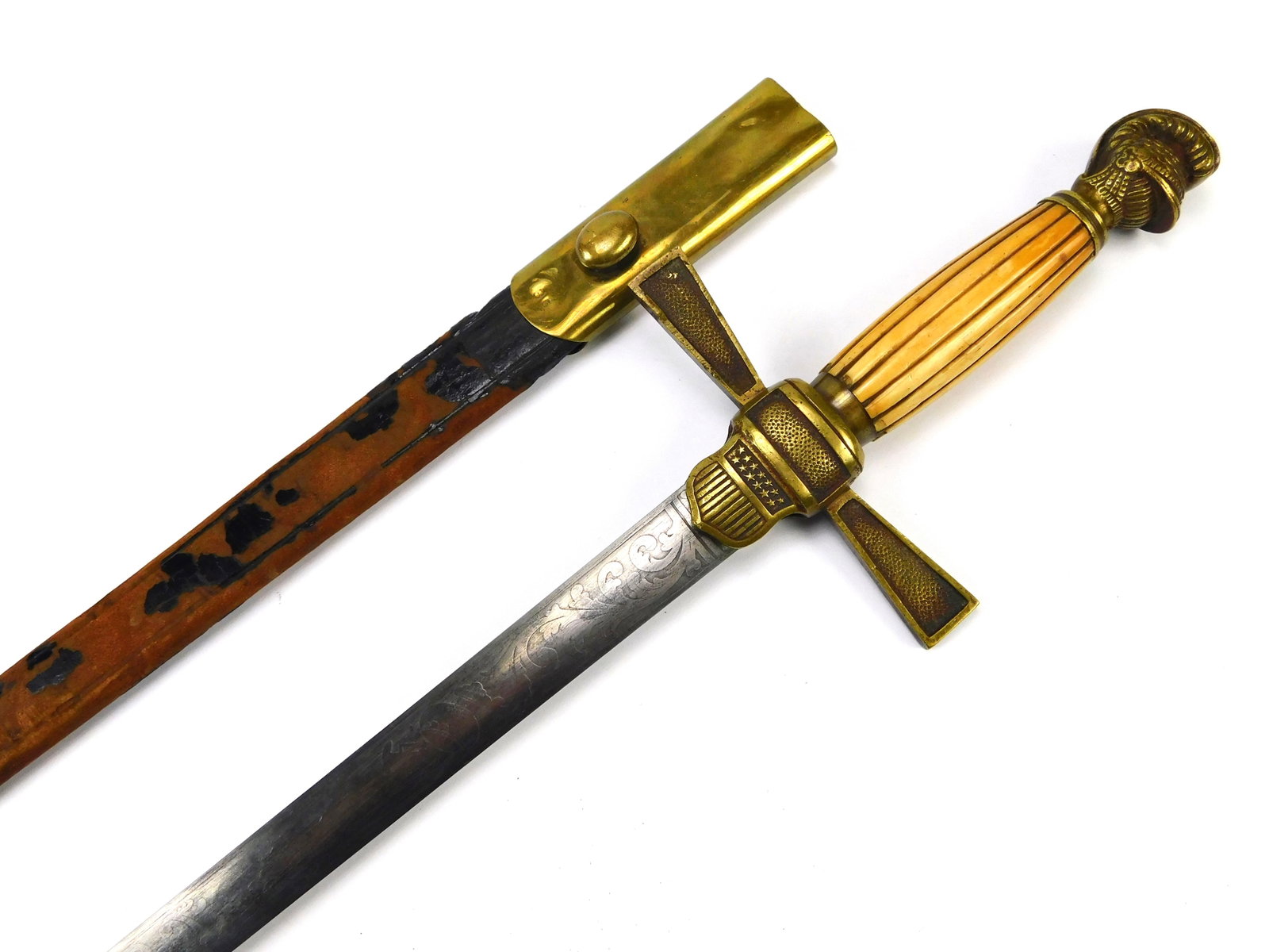Antique US Civil War Knights Head Engraved Militia Sword w/ Scabbard: US Civil War Engraved Militia Sword with Scabbard. Ox bone handle. Handle parts have some movement. 32 1/4" total length. The blade is 26 1/2". No international shipping for this item. LiveAuctioneers