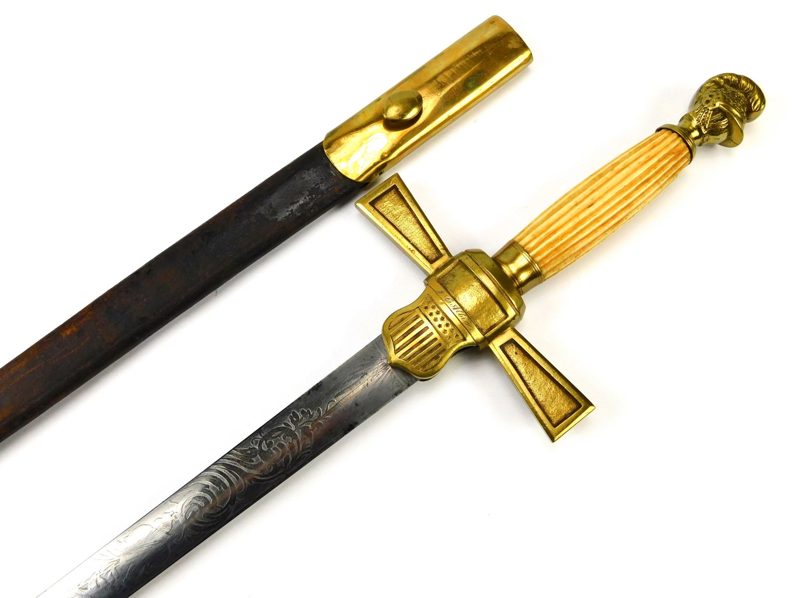 Antique US Civil War Knights Head Engraved Militia Sword w/ Scabbard: US Civil War Engraved Militia Sword with Scabbard. Ox bone handle. Handle parts have some movement. 31 1/2" total length. The blade is 25". No international shipping for this item. LiveAuctioneers is 