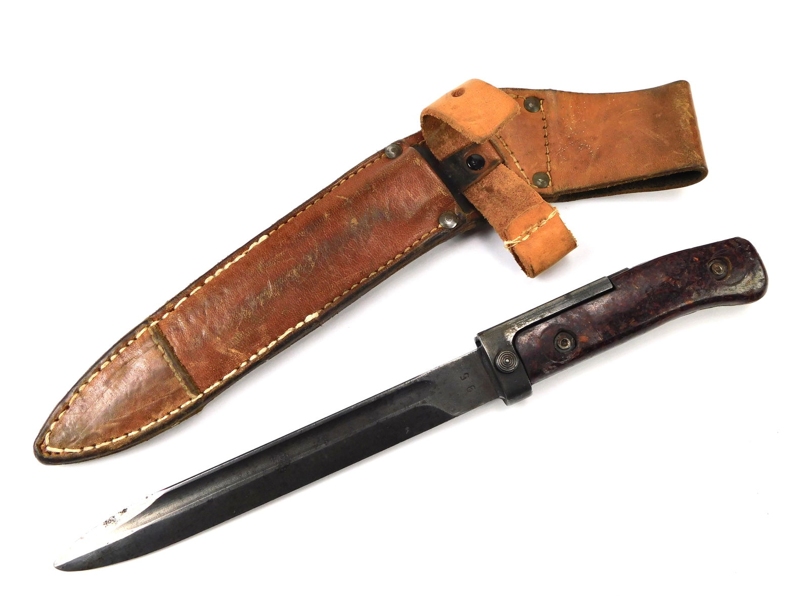 Cold War Era European Czechoslovakian Czech Bayonet: Vintage Czechoslovakian Cold War Period Bayonet with Leather Scabbard. The plastic handle part has movement. 11 1/8" long with 6 3/4" blade. LiveAuctioneers is currently displaying only their own expe