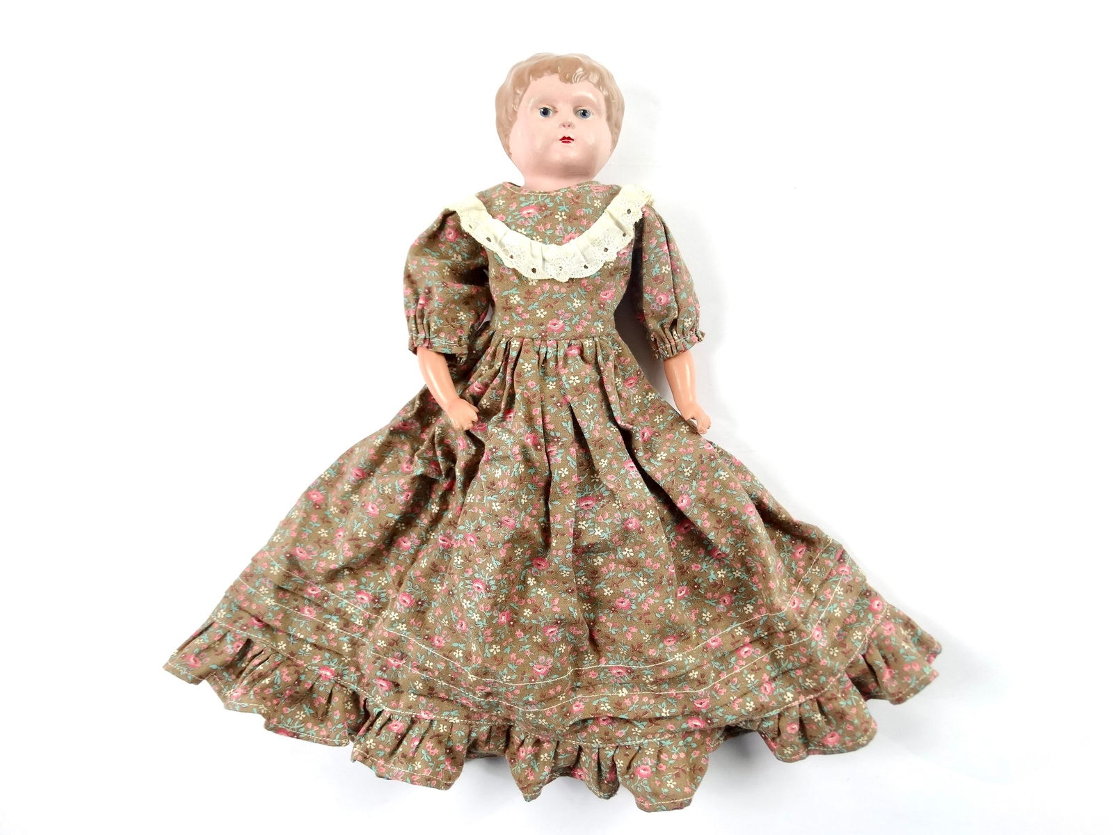 Vintage Metal Doll Signed Germany 4: Vintage Metal Doll Germany 4. The doll is 13" tall. Condition pictured. LiveAuctioneers is currently displaying only their own expensive shipping options. However, we offer reasonably priced in-house