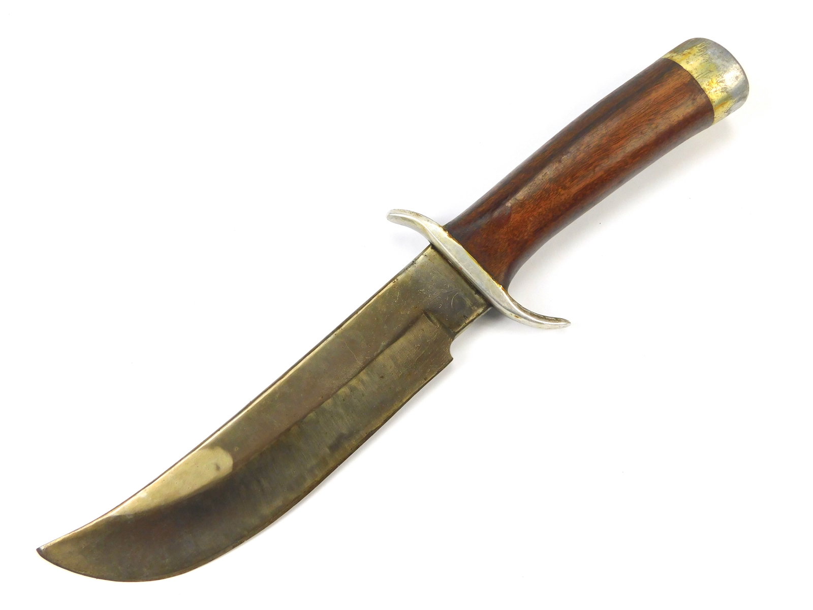 US WW2 Custom Made Handmade Theater Bowie Fighting Knife: US WW2 Custom Handmade Theater Fighting Knife. No sheath. The knife is solid, with no loose parts. Size: 11 7/8" total length, the blade is 7 1/8".LiveAuctioneers is currently displaying only it's own