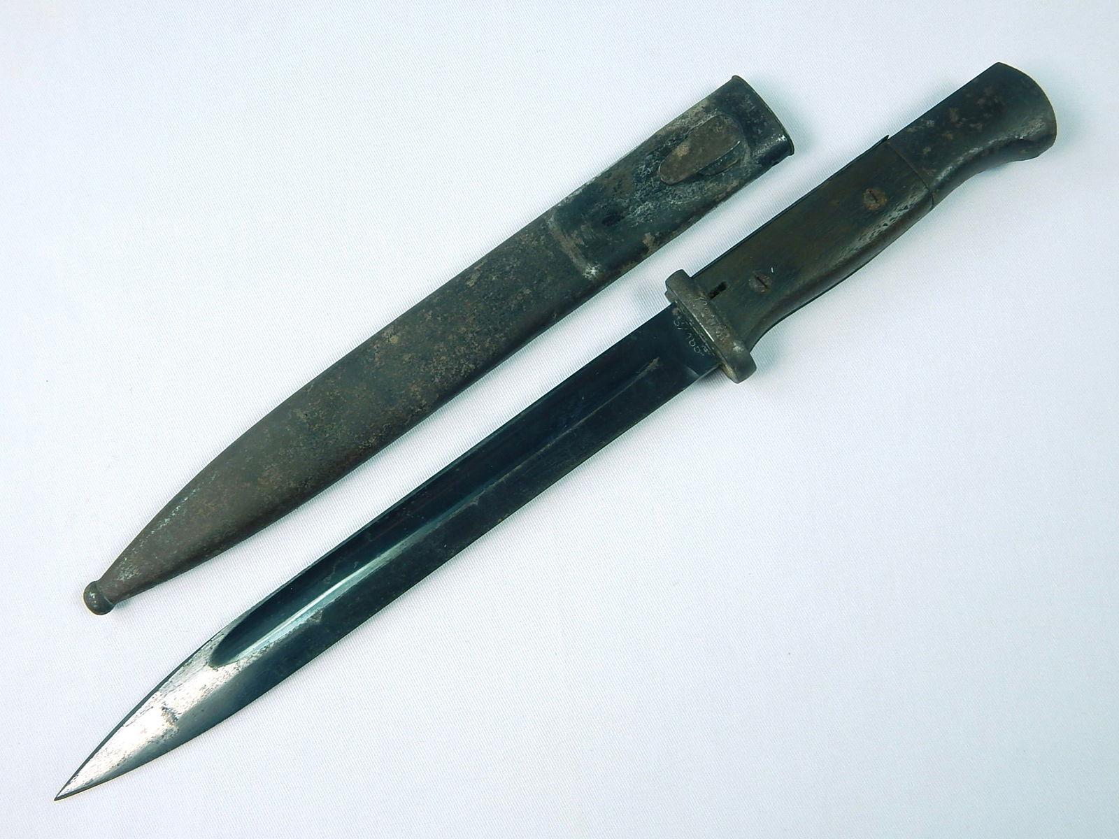 Rare German WW2 Navy Mauser K98 Bayonet Knife: Rare German WW2 Navy Marked Mauser K 98 Bayonet with Scabbard. Push button is stuck. Solid, no loose parts. 15 1/4" long with 10" blade. LiveAuctioneers is currently displaying only it's own expensive