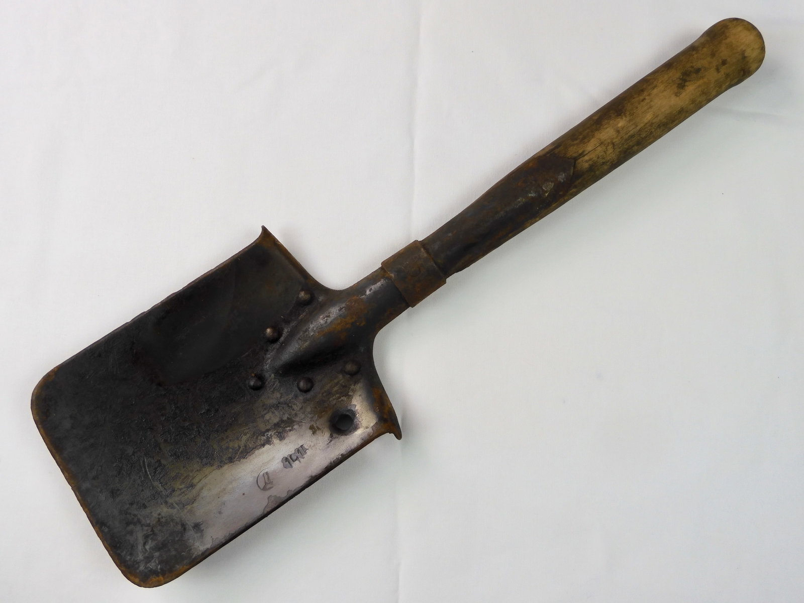 Imperial Russian WW1 1915 Entrenching Tool Shovel: Imperial Russian WW1 1915 Entrenching Tool. Measurements are pictured. LiveAuctioneers is currently displaying only it's own expensive shipping options. However, we offer reasonably priced in-house sh
