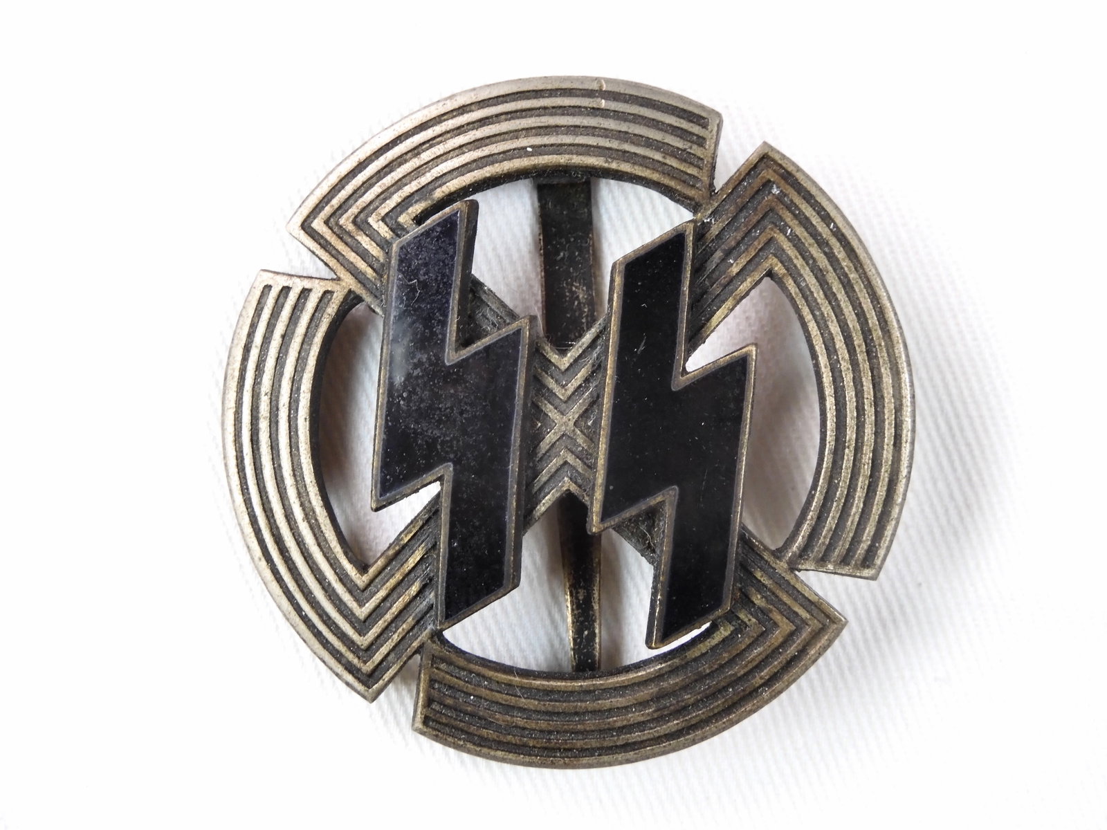 German Germany WW2 Germanic Achievement SS Badge Pin: German WW2 Germanic Achievement Badge of the SS. LiveAuctioneers is currently displaying only it's own expensive shipping options. However, we offer reasonably priced in-house shipping on most items. 