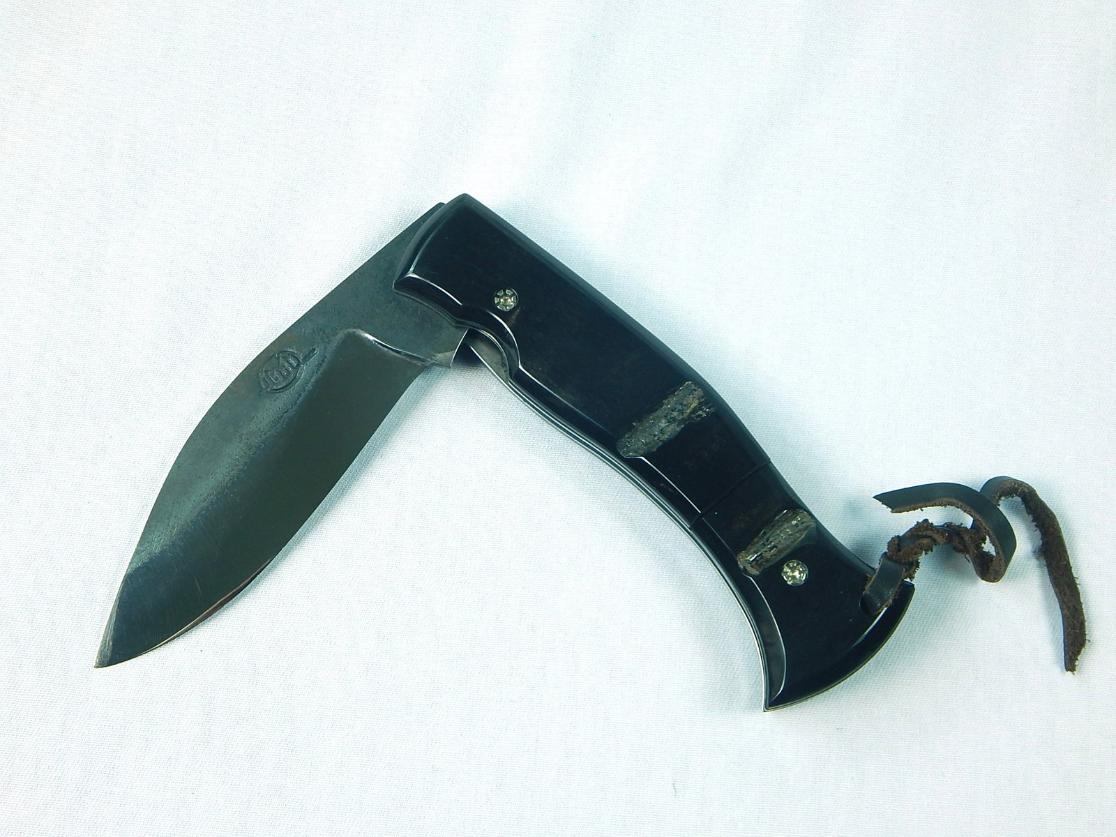 Custom Handmade CITADEL Large Folding Pocket Knife: Custom Made CITADEL Large Folding Pocket Knife. One handle plate is cracked. Measurements are pictured. LiveAuctioneers is currently displaying only it's own expensive shipping options. However, we of