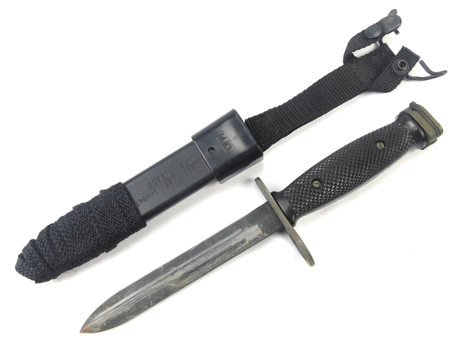 Vintage US Gen Cut M7 Bayonet Fighting Knife w/ Scabbard: Vintage US Gen Cut M7 Bayonet with Scabbard. Solid. 11 1/2" long with 6 3/8" blade. LiveAuctioneers is currently displaying only it's own expensive shipping options. However, we offer reasonably price