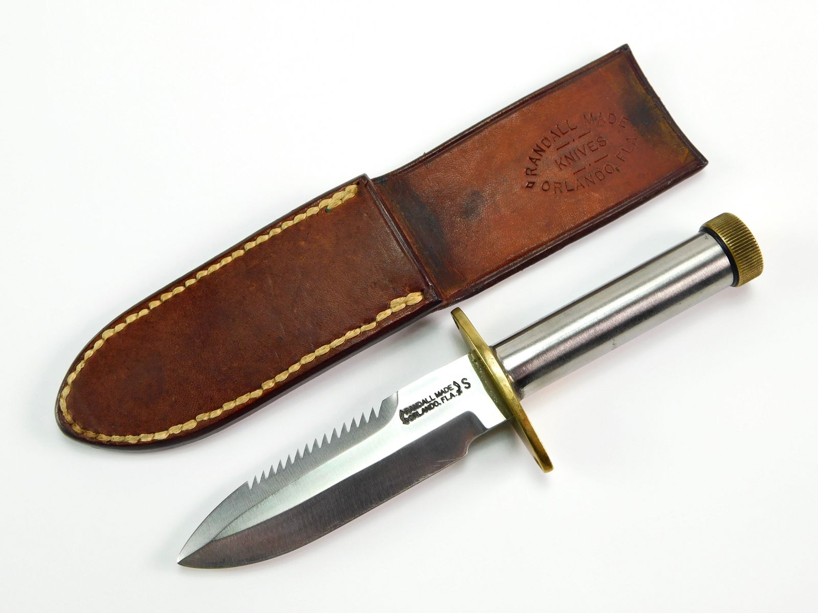 RANDALL Custom Miniature M18 Mini Survival Bowie Knife: RARE Vintage Early RANDALL Mini Survival Bowie Knife. With leather sheath. The knife is solid, with no loose parts. Size: 6 3/8" total length, the blade is 3 1/2".LiveAuctioneers is currently displayi