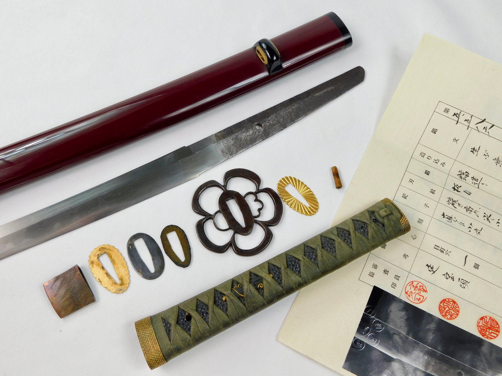 Antique Japan Mumei Sandai Owari Nobutaka Katana Sword: Antique Japanese Mumei Sandai Owari Nobutaka Katana Sword. With scabbard and papers. 35 3/8" long with 26 1/4" blade. Sorry, no international shipping for this item. LiveAuctioneers is currently displ