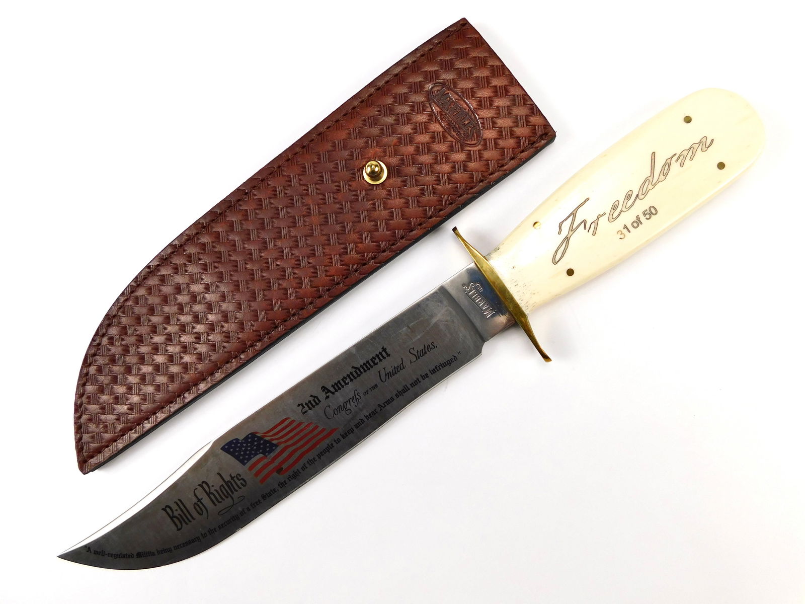 MARBLES Limited Trailmaker 2 Amendment Commemorative Large Bowie Knife: MARBLES Limited Trailmaker 2nd Amendment Commemorative Large Bowie Knife with Leather Sheath. # 35 out of 50. Knife is solid, no loose parts. Size: 15 3/8" total length, blade is 10 1/4". LiveAuctione