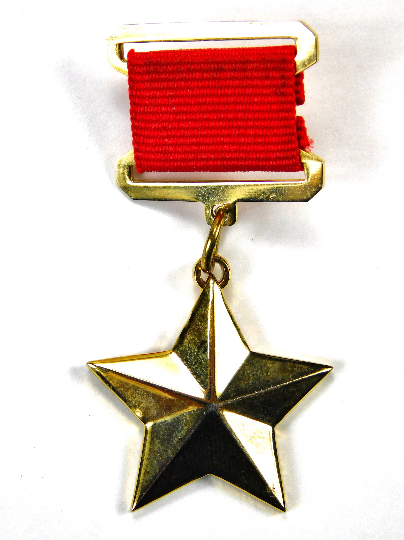 Reproduction Soviet Russian USSR WW2 Hero Star Medal Replica Award: In-House Shipping. Reproduction of the Soviet Russian / USSR WW2 Hero Star Medal, a replica of the prestigious award originally issued to recognize extraordinary heroism during World War II. This piec