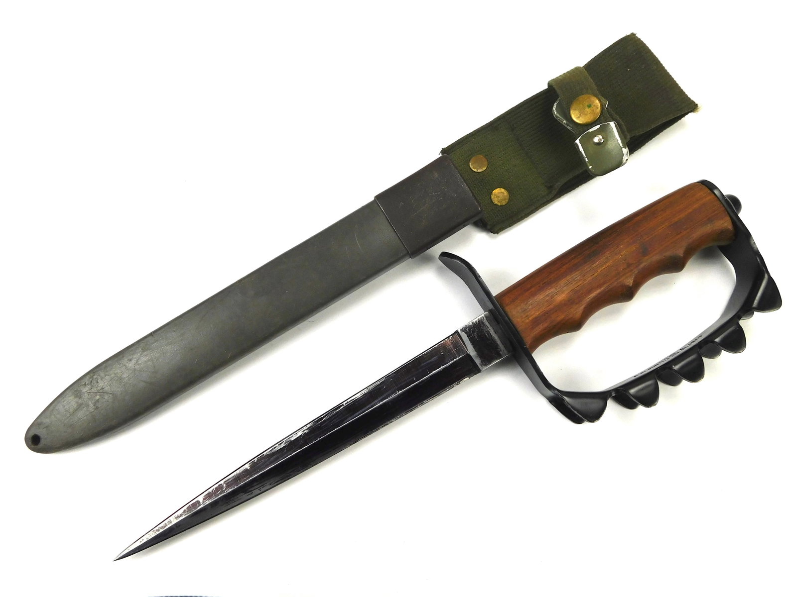 Vintage US Custom Made WW1 Type Fighting Knife: In-House Shipping. Vintage US Custom-made WW1-Type Fighting Knife with Scabbard. Handle parts are loose. 13 1/8" long with a 8" blade.