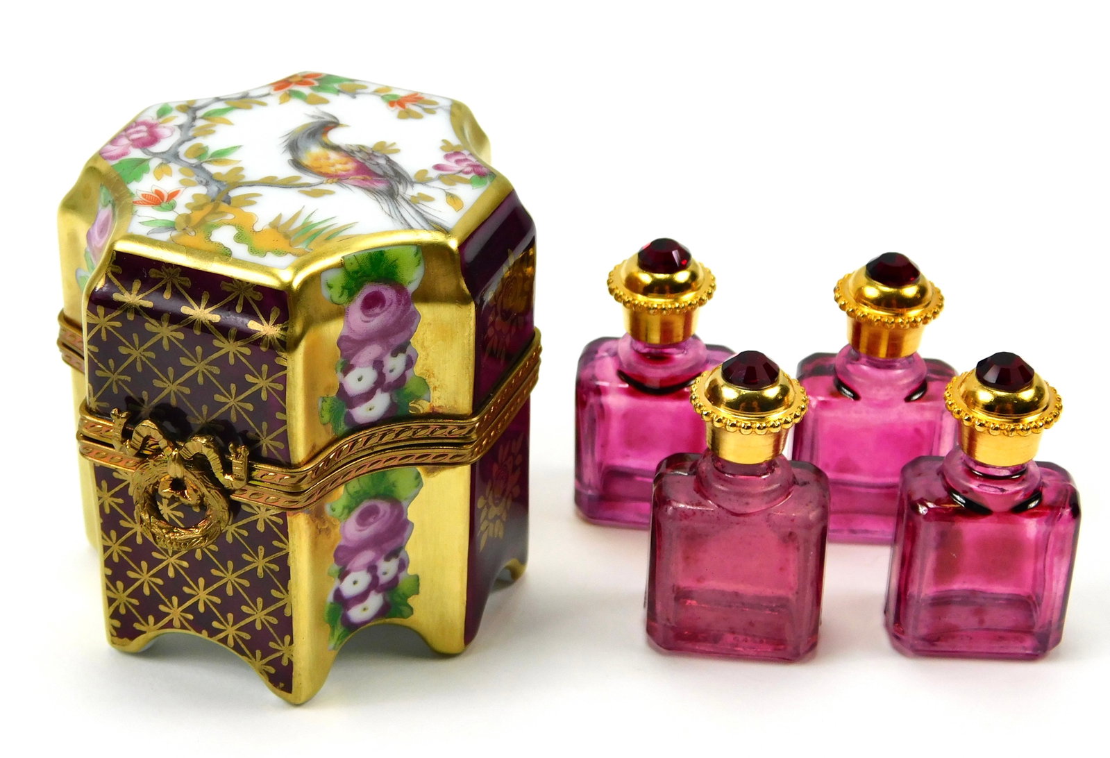 Limoges France Perfume Casket Porcelain Trinket Box 4 Amethyst Glass Bottles: In House Shipping. Limoges France hand-painted porcelain perfume casket trinket box in a tall scalloped form with ornate floral and bird decoration. The lid features a colorful bird perched among flow