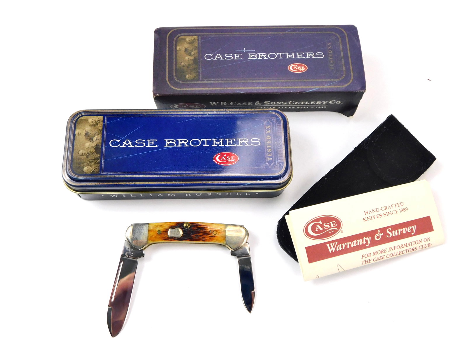 2005 Case XX Brothers Cutlery 62132 SS Badge Shield Baby Butterbean Folding Pocket Knife: In-House Shipping. US 2005 Case XX Brothers 62132 SS Antique Bone Badge Shield Baby Butterbean Folding Pocket Knife with Box. New old stock. Measurements are pictured. Blades snap, no wobble.
