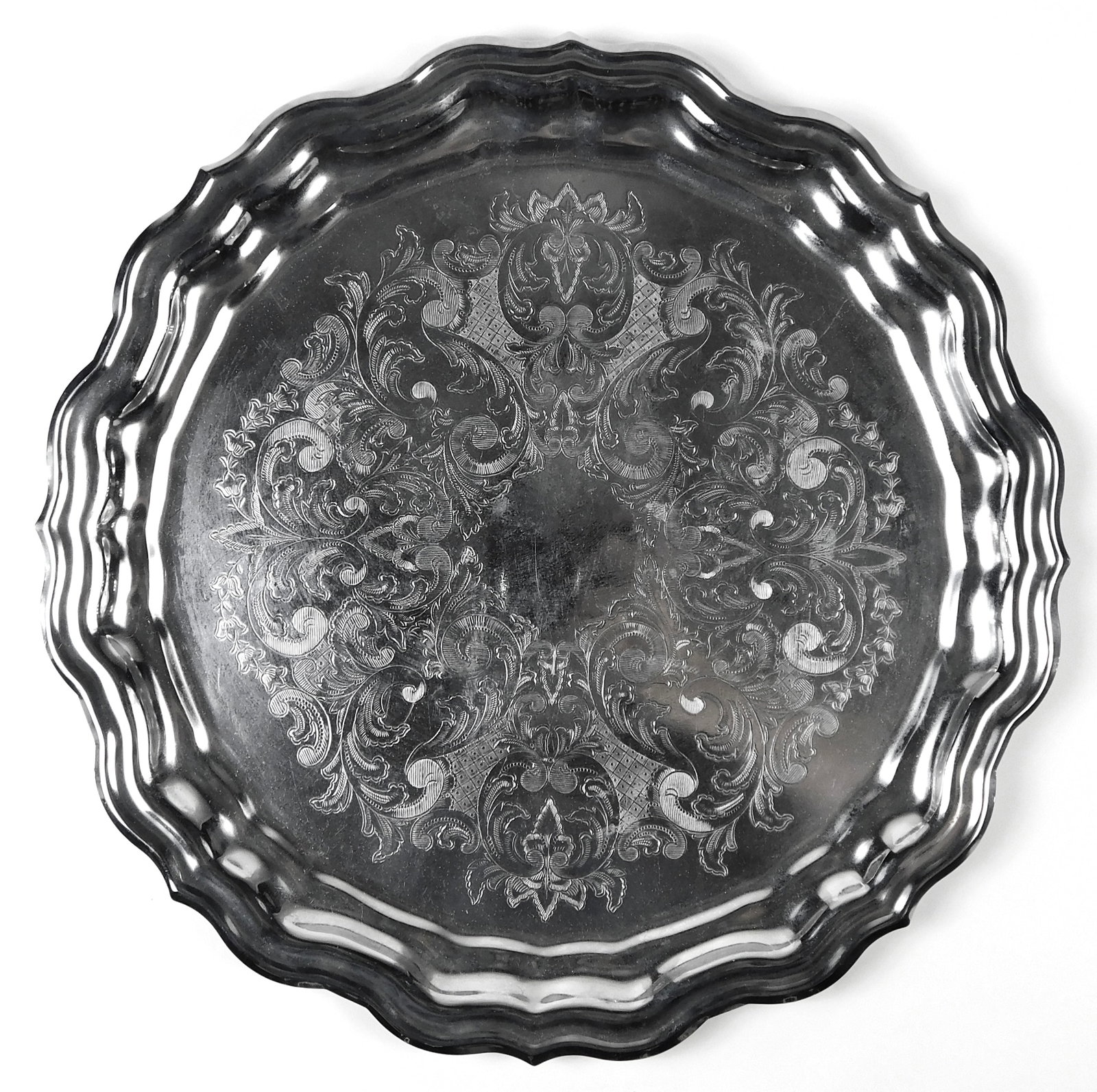 Soviet Kolchugino MNTs Melchior Serving Tray Engraved Floral Design: Vintage Soviet silver color melchior serving tray manufactured by the Kolchugino Non Ferrous Metals Factory, identified by the factory bird hallmark on the underside.Marked ???, indicating a copper ni