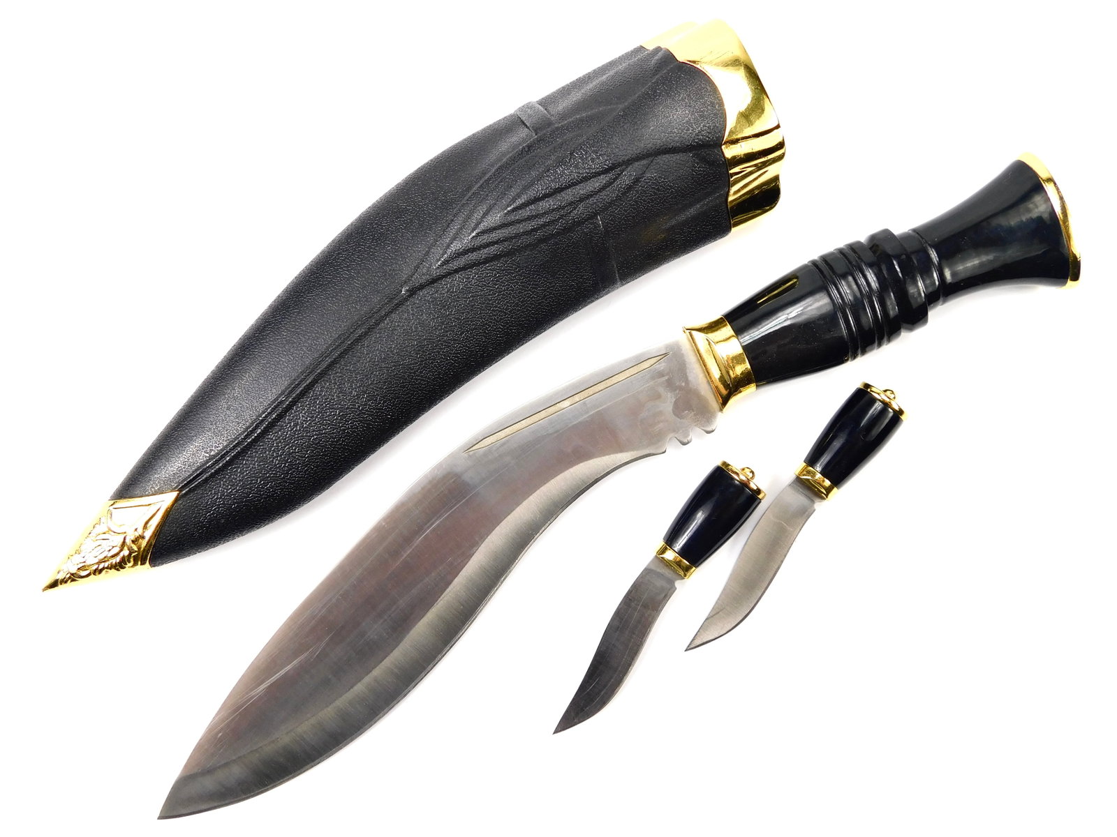 Indian Kukri Gurkha Lion Head Set of 3 Knife w/ Scabbard: Indian Kukri Set of 3 Knives. With scabbard. Made in China. Tight, no loose parts. Large knife is 11 7/8" long with 7 5/8" blade.