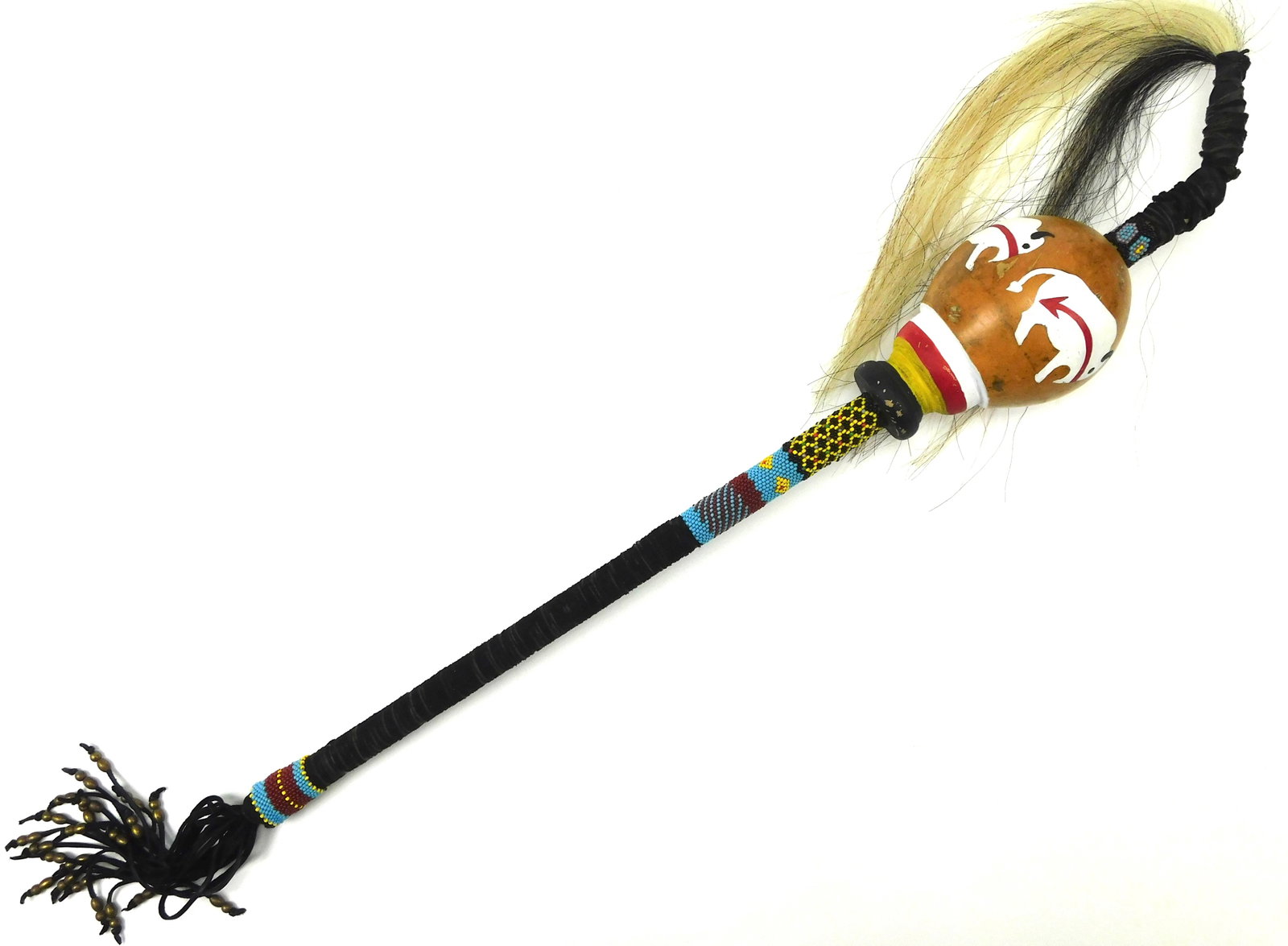 Native American Piqua Shawnee Ceremonial Rattle Kevin Lone Wolf Everhart: Native American ceremonial rattle handcrafted and signed by Kevin Lone Wolf Everhart, associated with the Piqua Shawnee.The painted wooden rattle head features a white buffalo with red heart line deco