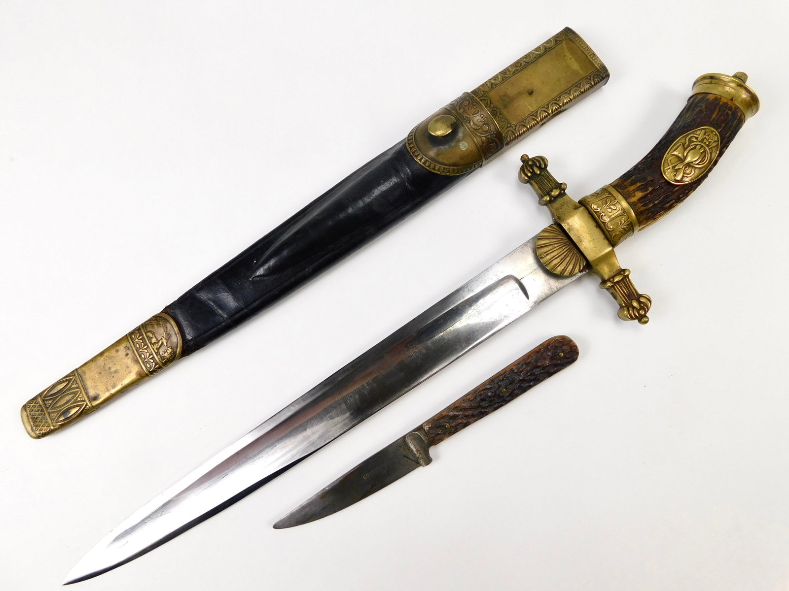 Antique Germany German Early 19 Century Dagger Knife Short Sword w/ Scabbard: German Early 19 Century Hunting Dagger with Scabbard and Small Knife. Handle parts are a little loose. Scabbard's leather is dry, the blade doesn't go into the scabbard all the way. 18 5/8" total leng