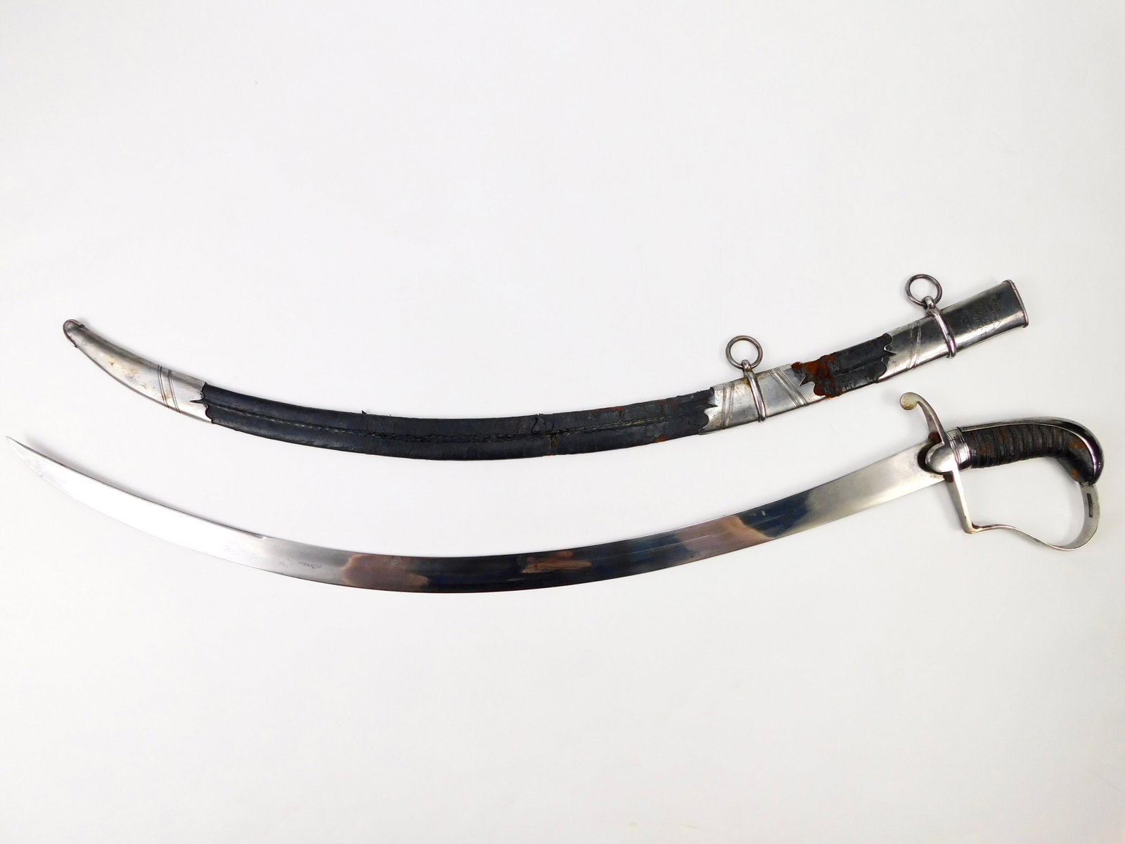 British English Antique 19 Century Napoleonic Flank Officer's Strongly Curved Sword Saber: British 19 Century Napoleonic Flank Officer's Sword with Scabbard. Solid, no loose parts. Scabbard's leather condition as pictured. 31" total length. The blade is 26 1/2".