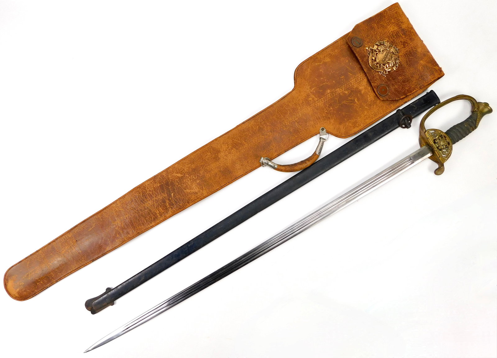 German Saxon WWI Officer’s Sword Saxony Coat of Arms with Scabbard & Leather Case: In House Shipping. German Saxon WWI period officer’s sword with scabbard and leather carrying case. Features a straight fullered blade, ornate brass-tone guard with the Saxon coat of arms, wire-wrap
