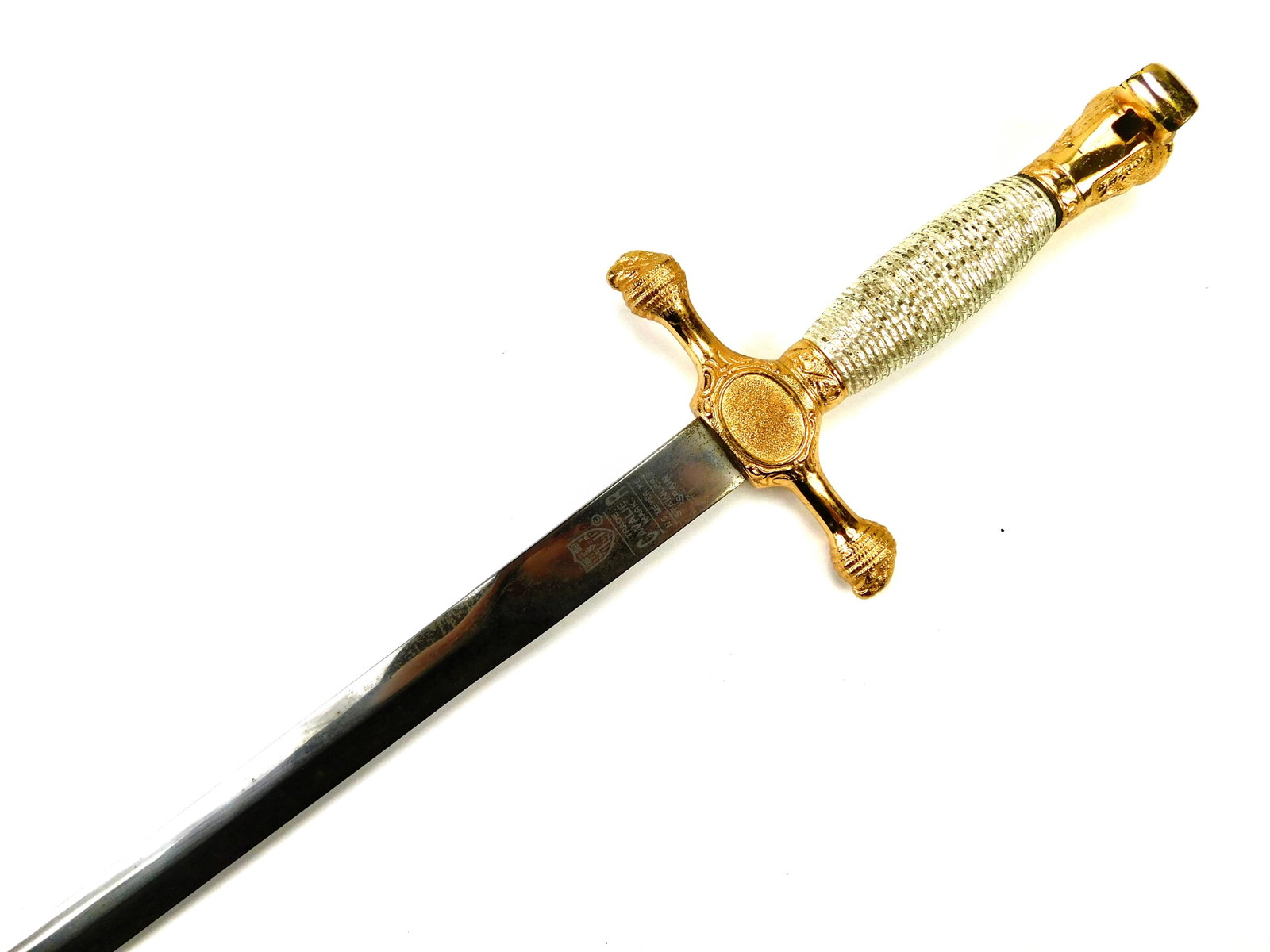 Vintage US Military Cadet Sword: Vintage US Military Cadet Sword. No scabbard. Handle parts are loose. 35 3/8" total length. The blade is 29 7/8".