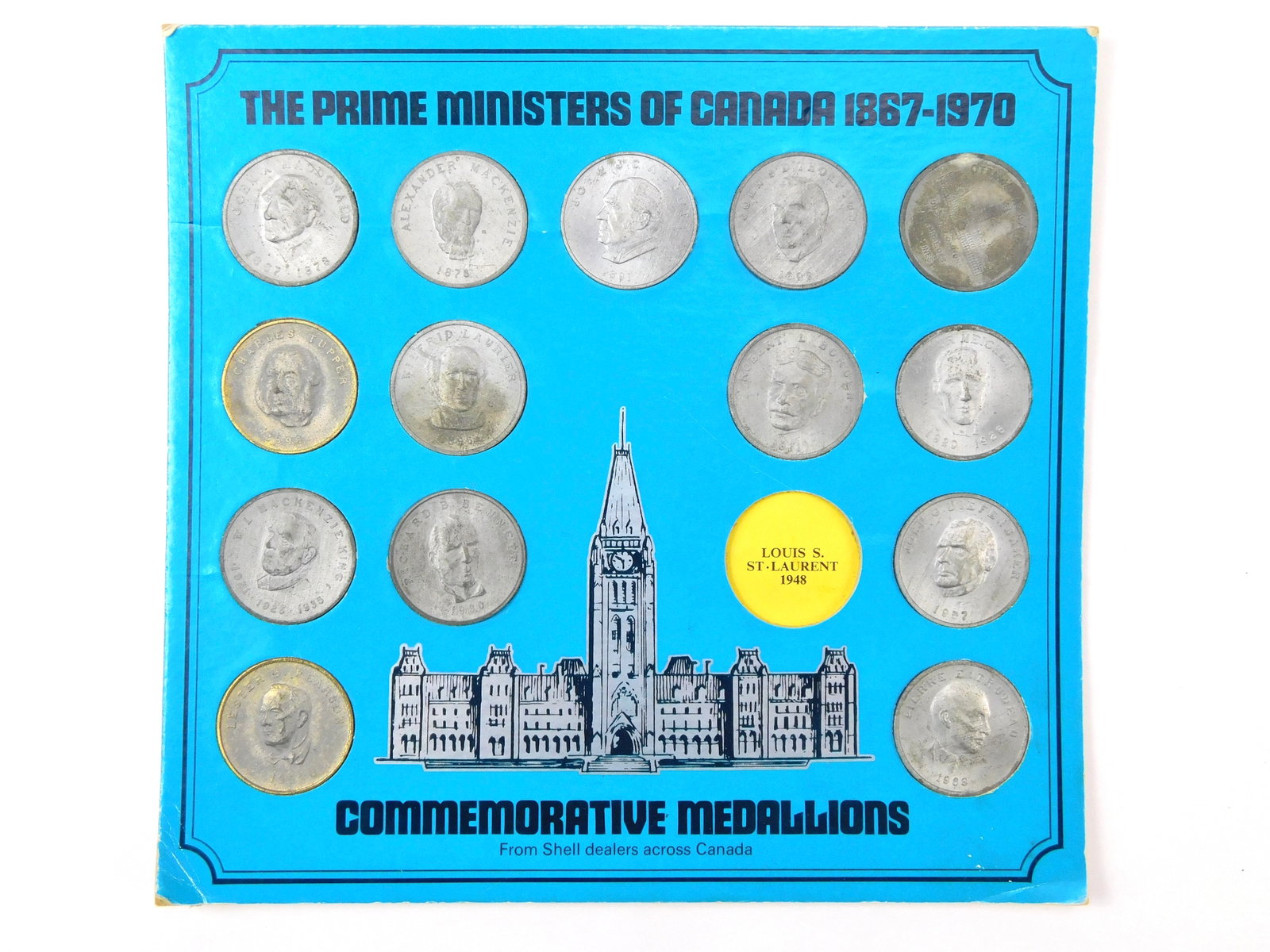 Vintage 1867-1970 Canada Prime Minister Shell Medallion Coin Medal Jeton Display: Vintage Prime Ministers Of Canada 1867-1970 Medallions Shell Dealer Display. One medallion is missing.