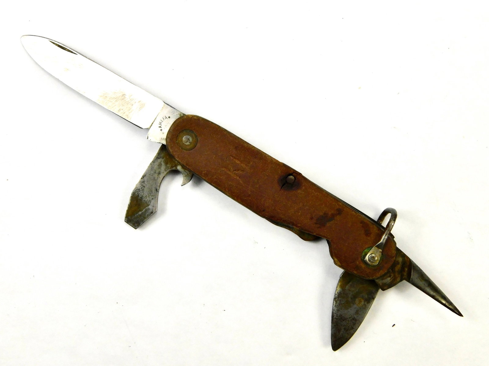 1950-60's Dutch Royal Armed Forces AMEFA Military Army Folding Pocket Knife: 1950-60's Dutch Royal Armed Forces AMEFA Military 4 Blade Folding Pocket Knife. The main blade doesn't snap when closing, no wobble. AMEFA is a Dutch manufacturer based in the city of Apeldoorn. The n