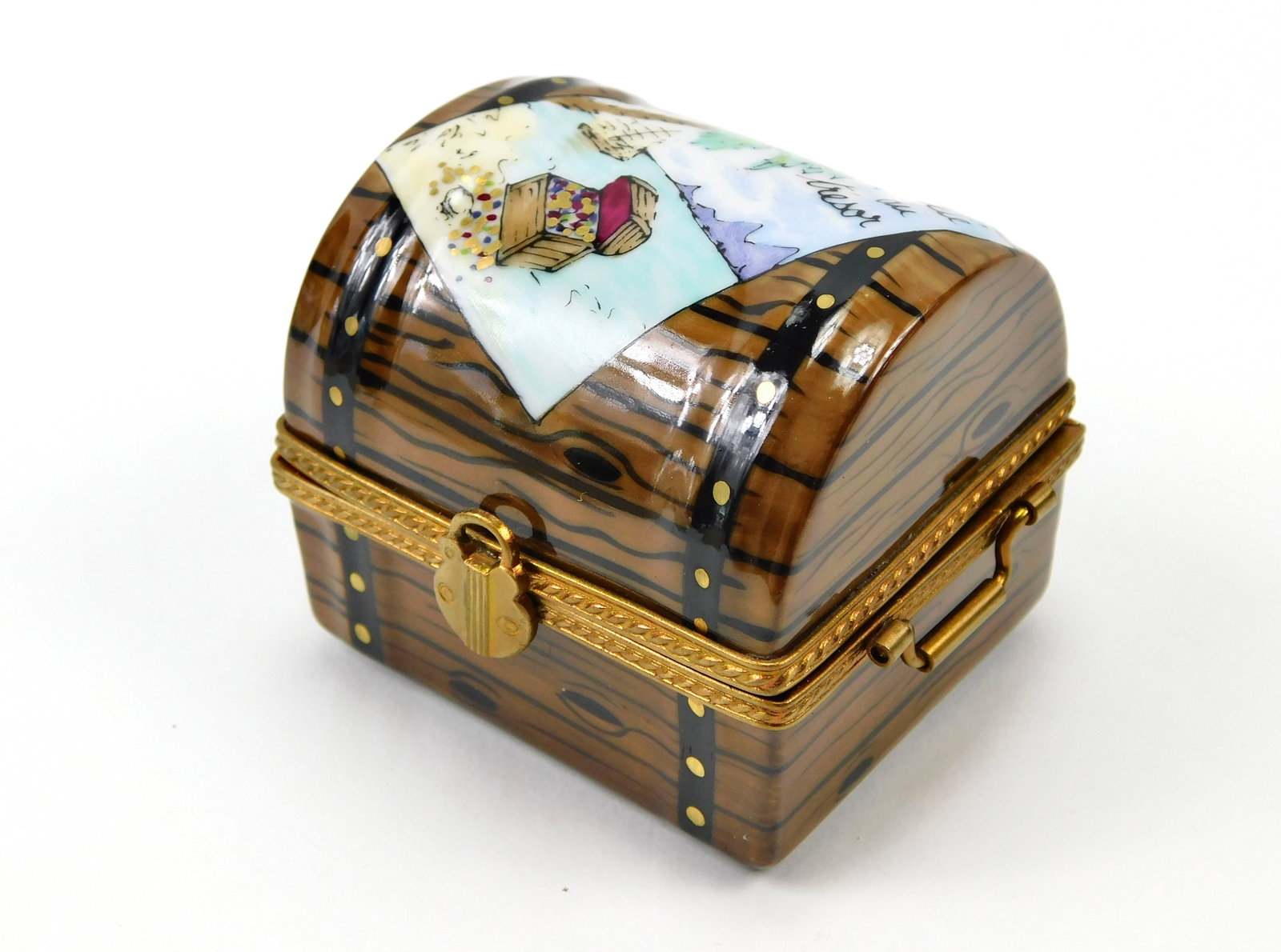 Limoges France PV Peint Main Treasure Island Pirate Chest Porcelain Trinket Box: In House Shipping. Limoges France hand-painted porcelain figural trinket box designed as a pirate treasure chest with wood-grain decoration, metal-style bands and movable side handles. The domed lid f