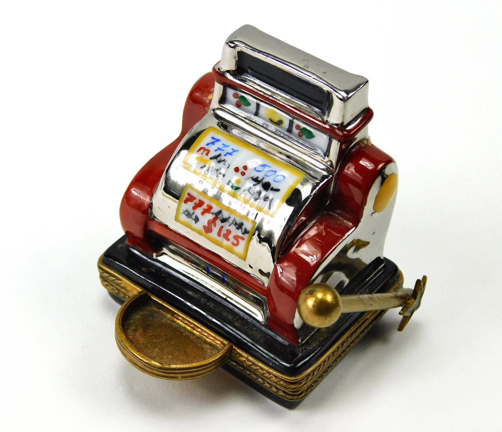 Limoges France Las Vegas Slot Machine Casino Porcelain Trinket Box: In House Shipping. Limoges France hand-painted porcelain trinket box modeled as a classic casino slot machine. Features metallic silver-tone and reddish-brown decoration with painted slot reels showin