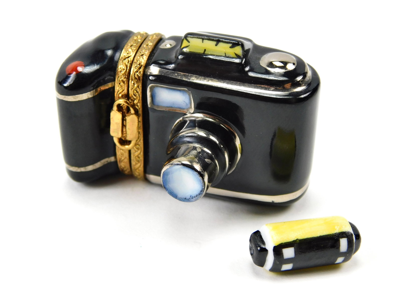 Rochard Limoges France 35mm Camera Porcelain Trinket Box Film Canister: In House Shipping. Rochard Limoges France hand-painted porcelain trinket box modeled as a classic 35mm film camera. Features a glossy black body with metallic silver-tone accents, dimensional lens, vi