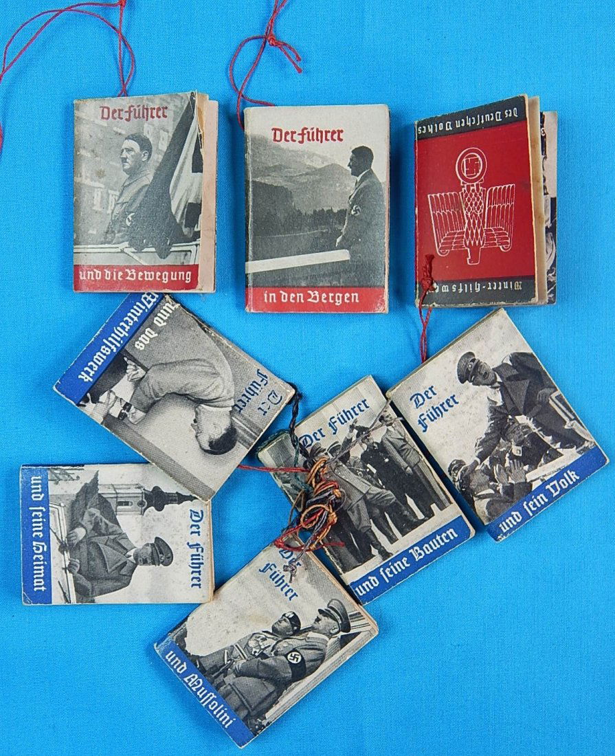 German WW2 Set 8 Third Reich Hitler Photo Booklet: German WW2 Set of 8 THIRD REICH PHOTO BOOKLETS ON ADOLF HITLER. GIVEN BY THE WINTERHILFSWERK (WHW) AS A TOKEN OF APPRECIATION FOR DONATIONS MADE TO THE NAZI WINTER AID PROGRAM.