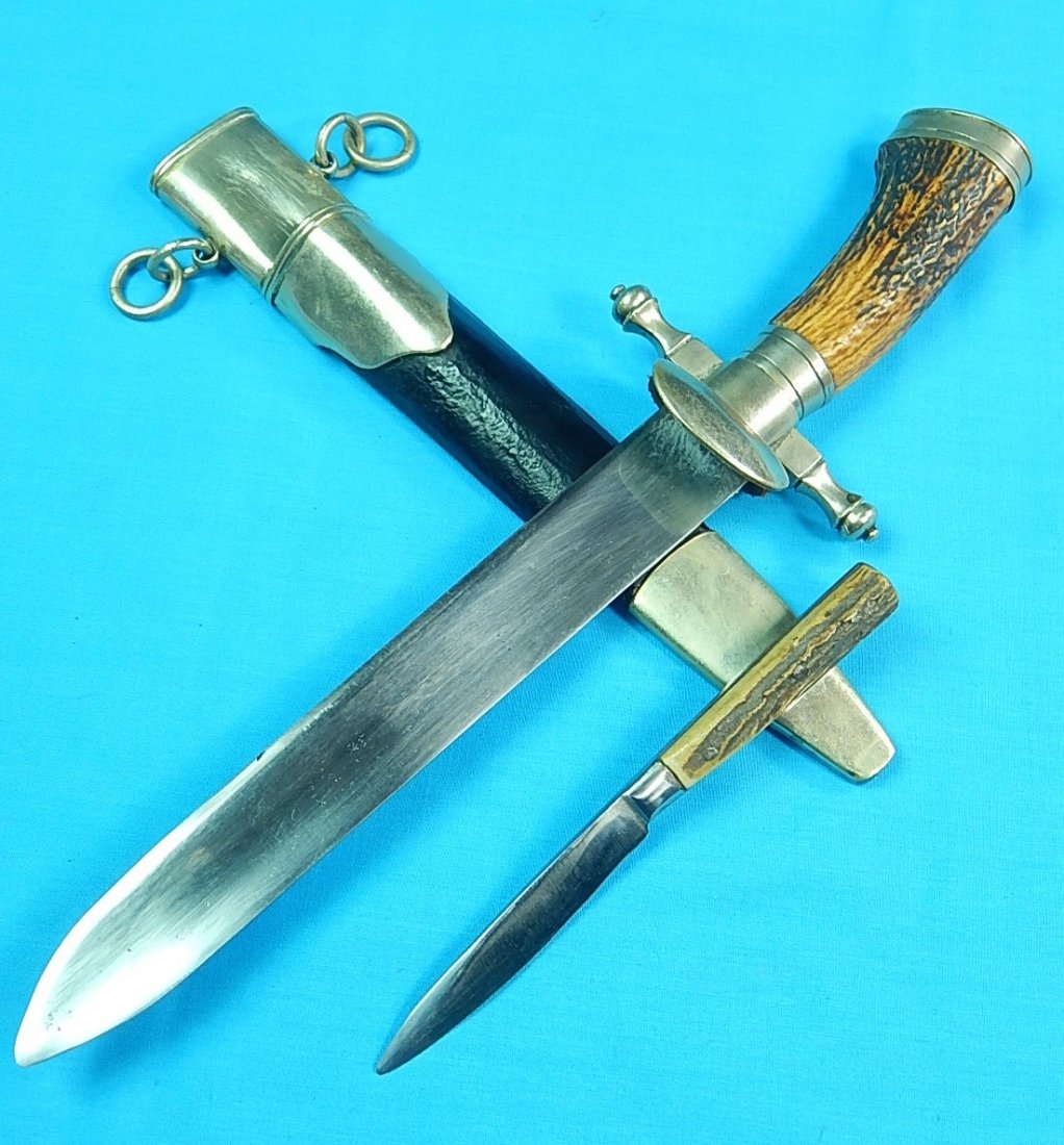 Antique German Germany Set Hunting Stag Knife: Antique 19 Century German Set of 2 Hunting Knives with Scabbard. Stag handles. Unmarked. Size: large one is 14 3/4" long with 9 1/4" blade, small one is 7" long with 3 1/2" blade.