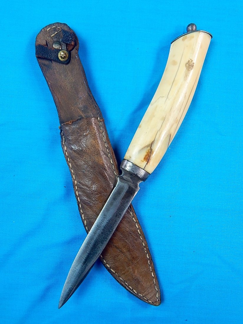 Antique French France Italy Italian Fighting Knife: NO BUYER"S PREMIUM! (BUYER"S PREMIUM 0%).Antique European French or Italian Fighting Knife with Leather Sheath. Ox bone handle. Size: 10 3/8" long with 4 7/8" blade.We accept payment by check or money