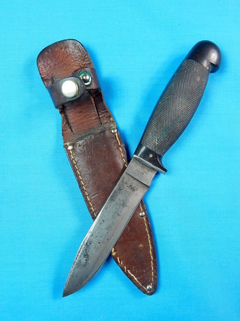 RARE Antique BRIDGE Cutlery Co. Hunting Fighting Knife: NO BUYER"S PREMIUM! (BUYER"S PREMIUM 0%)RARE Antique US BRIDGE Cutlery Co. St. Louis, MO Hunting Fighting Knife with Leather Sheath. Size: 9 1/2" long with 4 7/8" blade.We accept payment by check or m