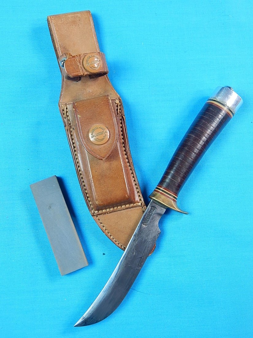 Vintage Custom Hand Made RANDALL Hunting Fighting Knife: NO BUYER"S PREMIUM! (BUYER"S PREMIUM 0%)Vintage Custom RANDALL Made Orlando , FL Hunting Fighting Knife with Original Leather Sheath and Sharpening Stone. Size: 9" long with 4 1/2" blade.We accept pay
