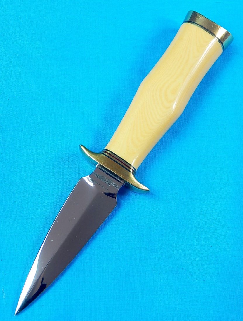 Custom Made GIL HIBBEN Stiletto Hunting Fighting Knife: NO BUYER"S PREMIUM! (BUYER"S PREMIUM 0%).US Custom Hand Made by GIL HIBBEN Stiletto Hunting Fighting Knife. No sheath. Size: 8 1/2" long with 3 7/8" blade.We accept payment by check or money orders.Pa