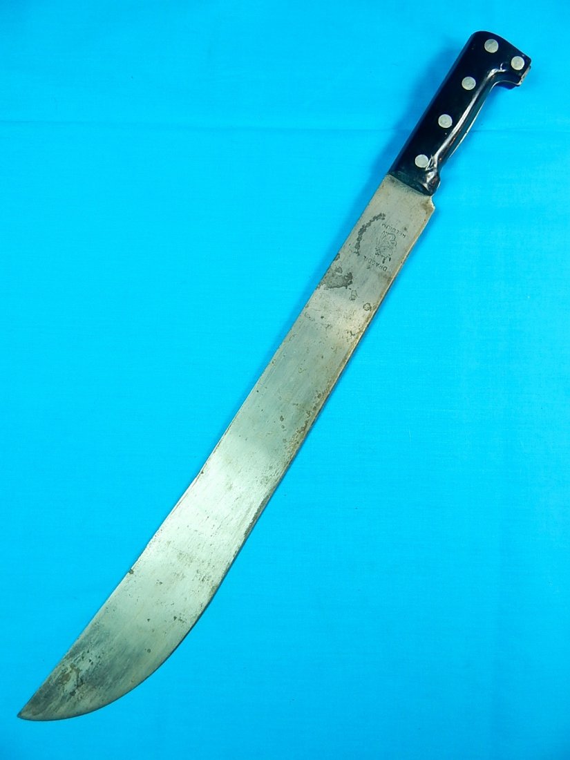 Vintage Belgium Belgian DRAGON Fighting Machete Sword: NO BUYER"S PREMIUM! (BUYER"S PREMIUM 0%).Vintage Belgian DRAGON Fighting Machete. No scabbard. Size: 23" long with 18 1/4" blade.We accept payment by check or money orders.Pay Pal and bank transfers a