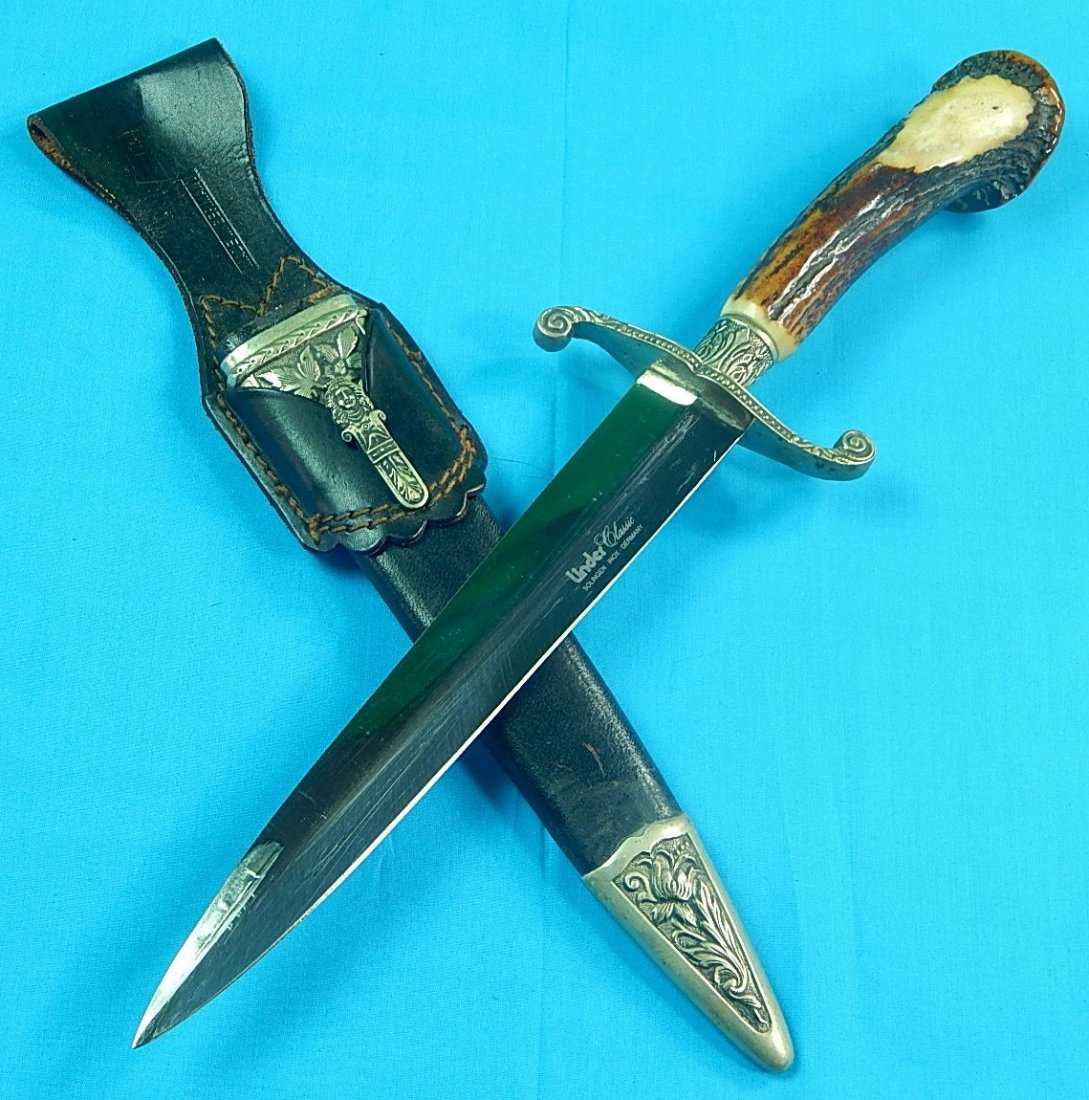 RARE German Germany LINDER Unusual Fancy Dagger Knife: NO BUYER"S PREMIUM! (BUYER"S PREMIUM 0%). Vintage RARE German Solingen LINDER Unusual Fancy Hunting Dagger with Scabbard and Leather Frog.Stag handle.Size: 14 1/2" total length, blade is 8 3/4".We acc