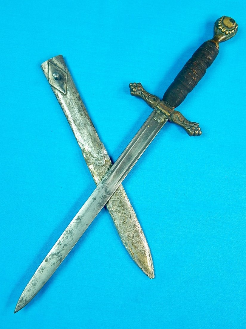 Antique Spanish French Italian Stiletto Knife Dagger: NO BUYER"S PREMIUM! (BUYER"S PREMIUM 0%).Antique Spanish or French or Italian? Stiletto Fighting Knife with Original Metal Scabbard. Size: 14 1/2" long with 9 1/2" blade.We accept payment by check or 