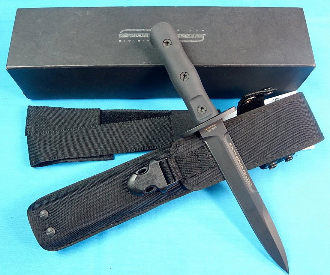 Italy Italian EXTREMA RATIO OPERATIVO Fighting Knife: NO BUYER"S PREMIUM! (BUYER"S PREMIUM 0%).Italian EXTREMA RATIO Model OPERATIVO Fighting Knife with Sheath and Box. Size: 12 1/2" long with 7 5/8" blade.We accept payment by check or money orders.Pay P