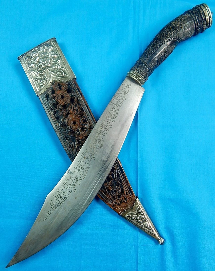 Antique Indonesia Indonesian Large Silver Knife Sword: NO BUYER"S PREMIUM! (BUYER"S PREMIUM 0%).Antique Indonesian Large Fighting Knife .With leather scabbard with silver fittings,Carved buffalo horn handle with silver fittings,Fittings on the handle are 